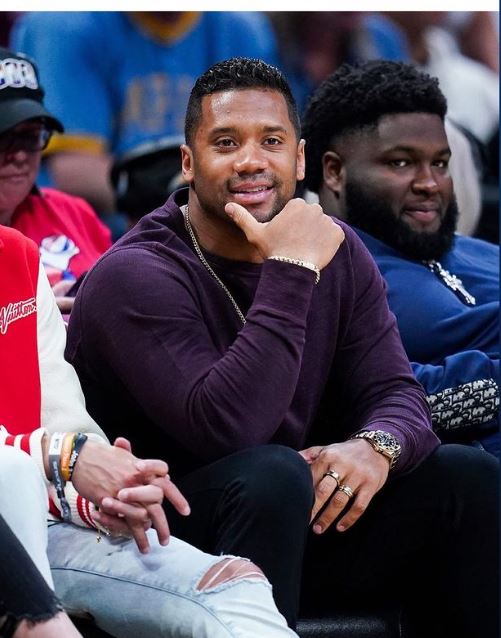Russell Wilson Shows Supports To Nikola Jokic In Game 1